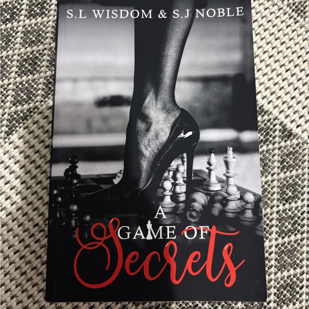 3/20$ A Game of Secrets by S.L Wisdom & S.J Noble